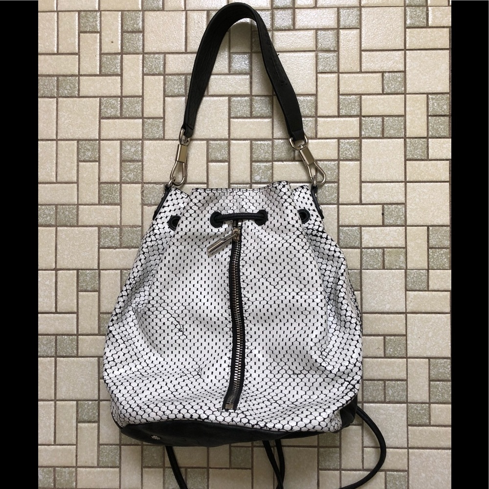 Authentic Elizabeth and James bucket/backpack bag